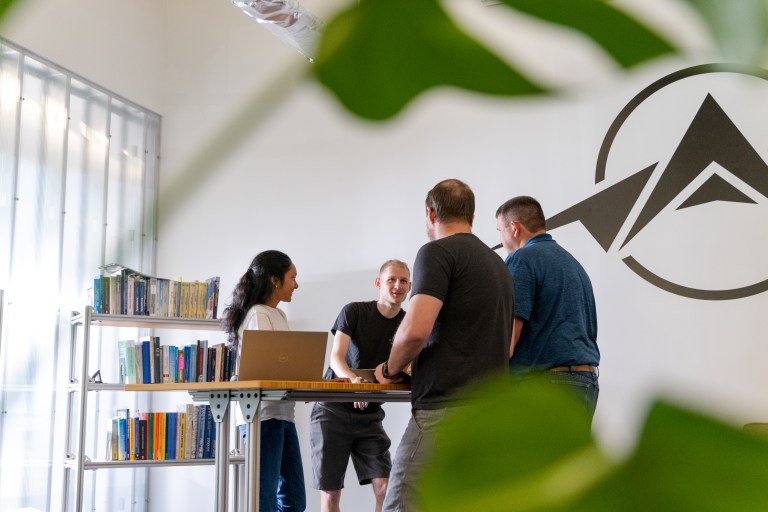 Employees collaborating in the office.