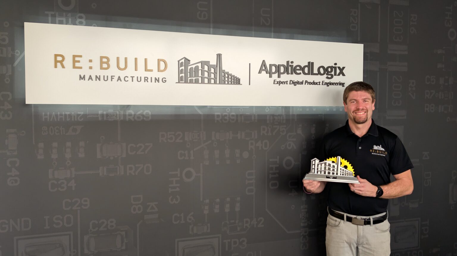 Tim Duffy with his Re:Build Award