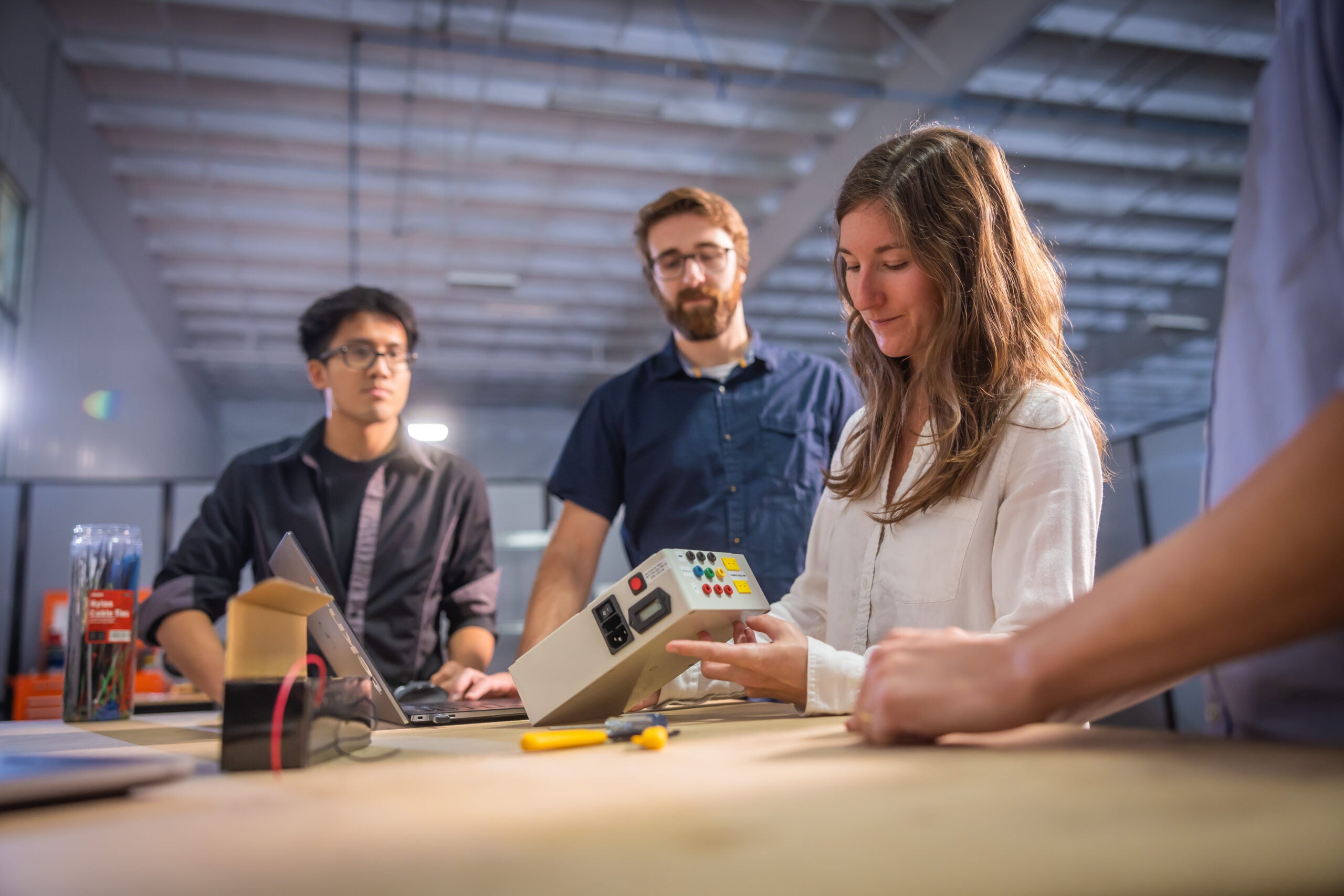 employees discussing a product