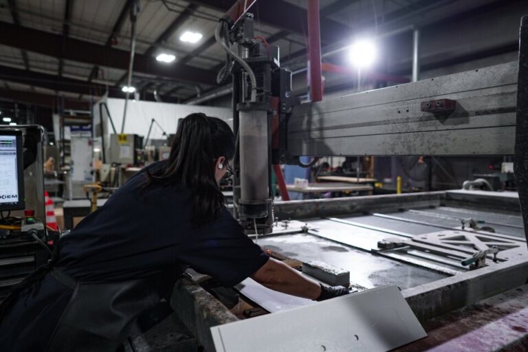Employee working on machine