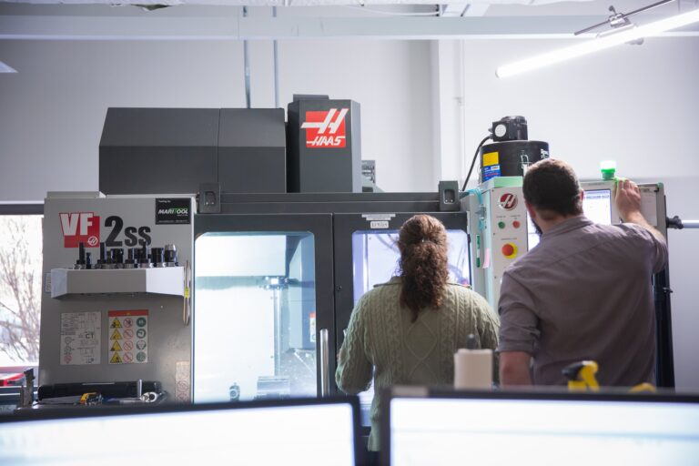 employees working on a machine